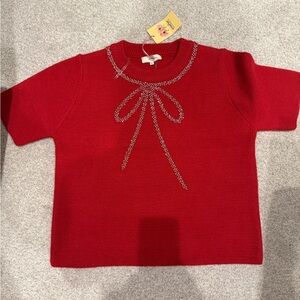 Red bow sweater- shirt sleeves. Would be veryy cute for the holidays